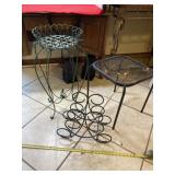 Iron plant stand, table and wine bottle holder.