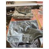 Jordache and another hanging clothes suitcases.