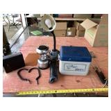 Small cooler, flyswatters, lights and binoculars.