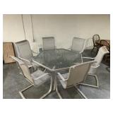 Outside Tan octagon table  with 6 chairs