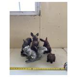 Resin squirrels and rabbit statues.