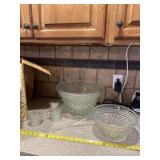 Two punch bowls, laddle and cups.