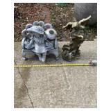 Resin girl on bench and angel decor.