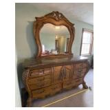 Michael Amini dresser with mirror and marble top.