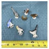 Ceramic birds one broken wing and glued back on