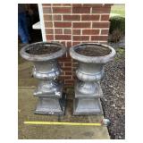 Two resin planters 29 inches tall
