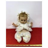 Plated Moulding 1961 wind up musical doll.