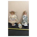 Three porcelain dolls