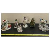 Snowmen and music wind up Christmas tree decor.