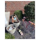 Planter and bicycle outdoor decor.