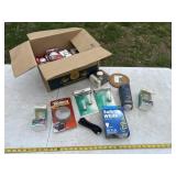 Box of light bulbs with furniture sliders