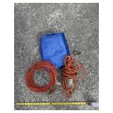 Drop light with extension cords and plastic cover