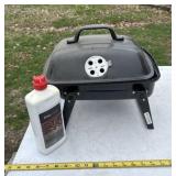 Backyard Charcoal grill with lighter fluid
