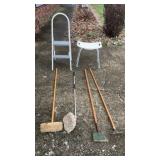 Step stool shower seat, a hoe, some mops