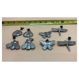 8 metal insect-themed items are decorative