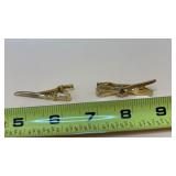 Masonic-themed novelty tie clip featuring a fork