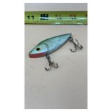 Hard-bodied, lipless crankbait