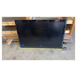 LG 47in TVRemote and cord in bag attached to