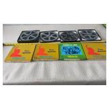 Blackhawk Films 8mm movie reels and boxes,