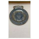 Bronze collectible medal from the 32nd Annual