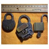 three vintage metal padlocks
