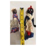 two  handmade fabric dolls, likely 'folk