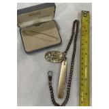 Pocket knife with charm on chain