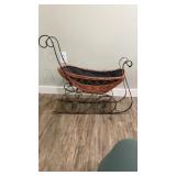 Metal and wicker Christmas sleigh