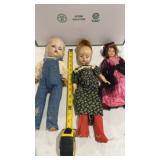 Vintage dolls with handmade clothing and sleepy