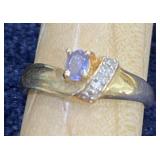 10k gold ring accented with small diamonds.1.93g