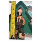 Vintage hillbilly holding moonshine jug