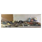 Rulers, leveler, WD-40 Sawhorse brackets, metal