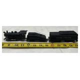 vintage model train set featuring a black steam
