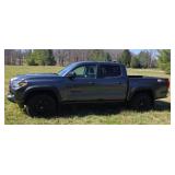 2024 Toyota Tacoma SR5 with 47,720 miles.