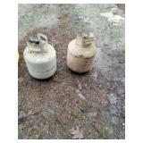 Two empty propane tanks.