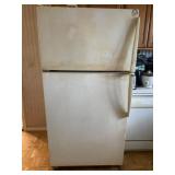 Older Amana refrigerator measures 33 inches wide