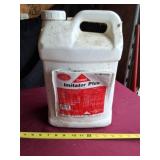 Imitator Plus herbicide over half full.