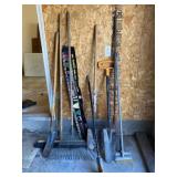 Brooms, rakes and shovels.