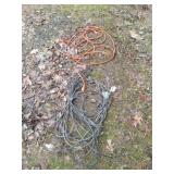 Extension cord and roll of coax.