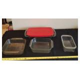 Pyrex cake, loaf and casserole dishes with a lid.