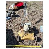 Push mowerbunknown running with bad tires.