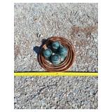 Hemingray insulators and copper pipe.