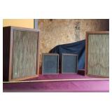 Canal speakers with stains on front.