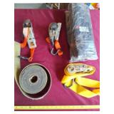 Ratchet straps and Black & Decker bag.