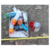 Orange marking paint, pan and paint thinner.