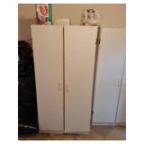 Wood cabinet with all contents on and above it.