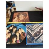 Elvis, Rolling Stones and The Beatles records.