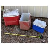 Three coolers one missing lid.