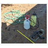 Two hand sprayers, sprinkler and garden hose w
