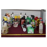 WD 40, gear oil and everything on table.